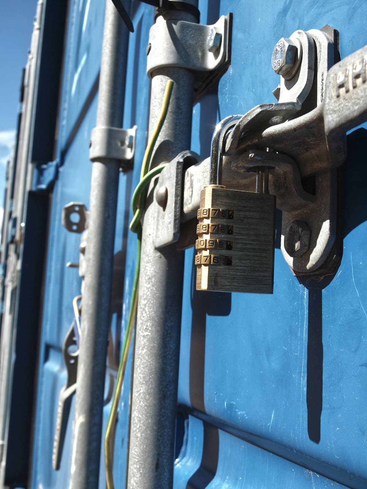 Locked door bars of a trailer with the seal wire in place